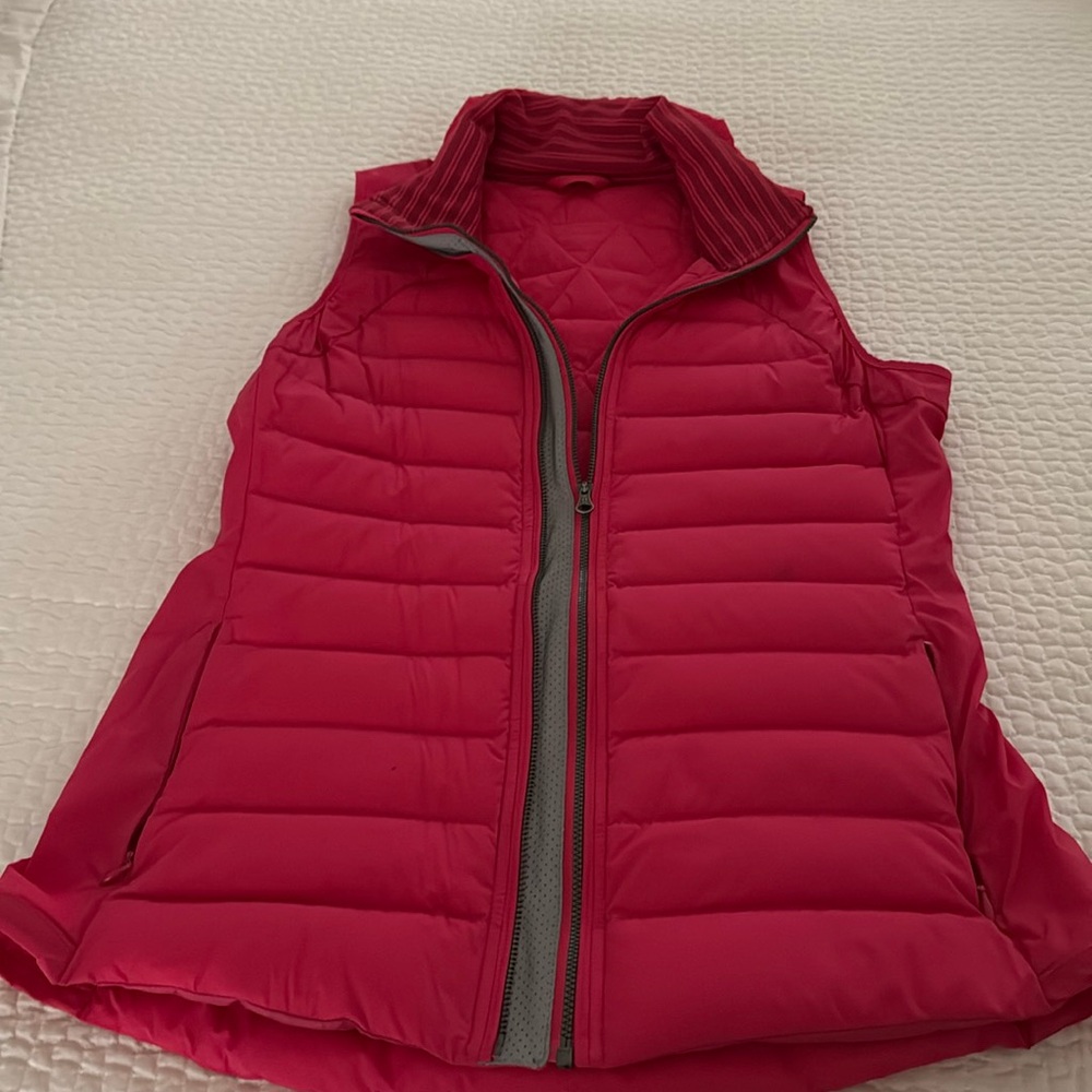 Lululemon vest with reflective strip
Size 8